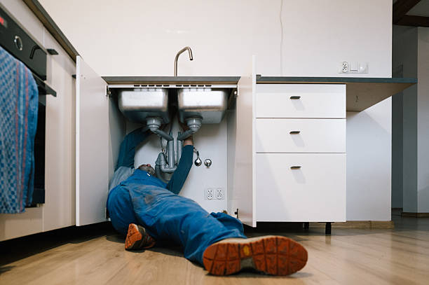 Professional Drain Cleaning technician working in Dacono, CO